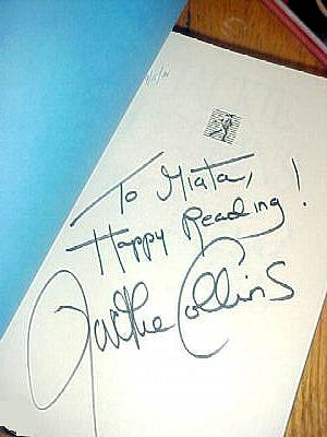 Signature of Jackie Collins